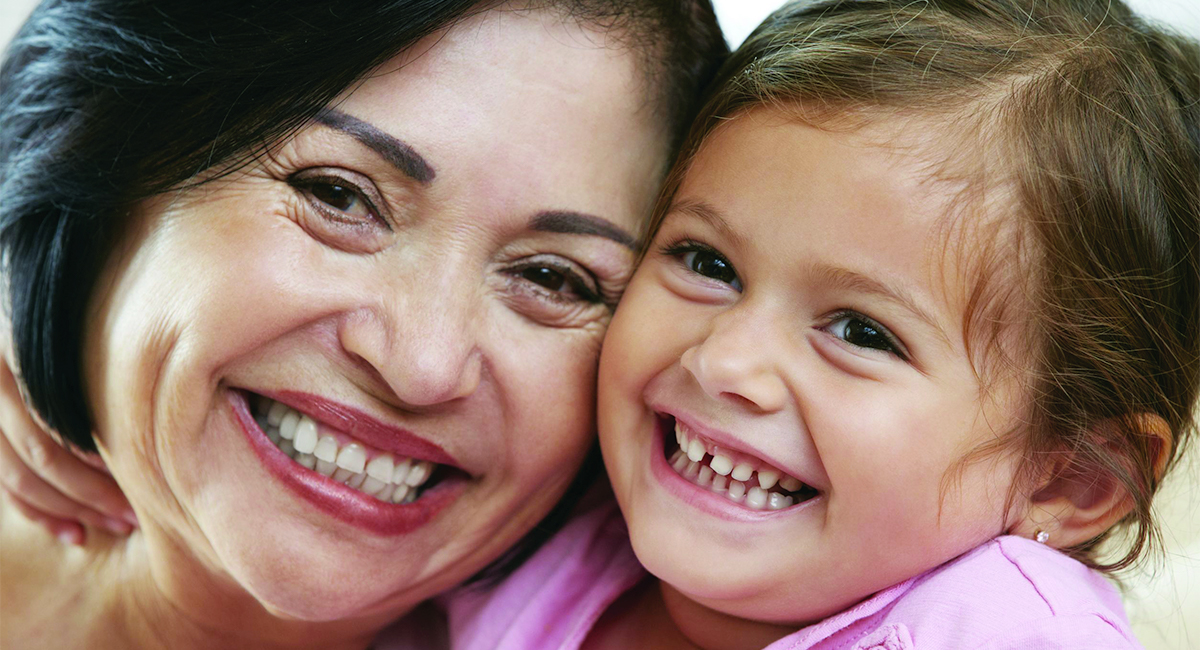 mother-daughter smiling